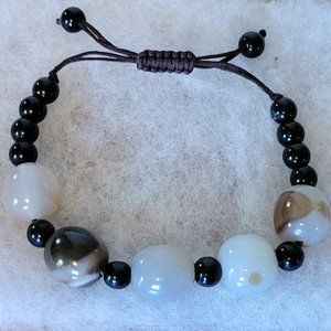 Unisex beaded stone adjustable lea bolo bracelet.